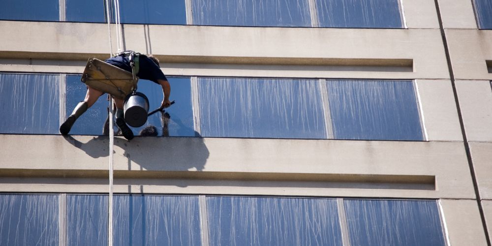 Read more about the article Essential Tools and Techniques Used By Professional Window Cleaners